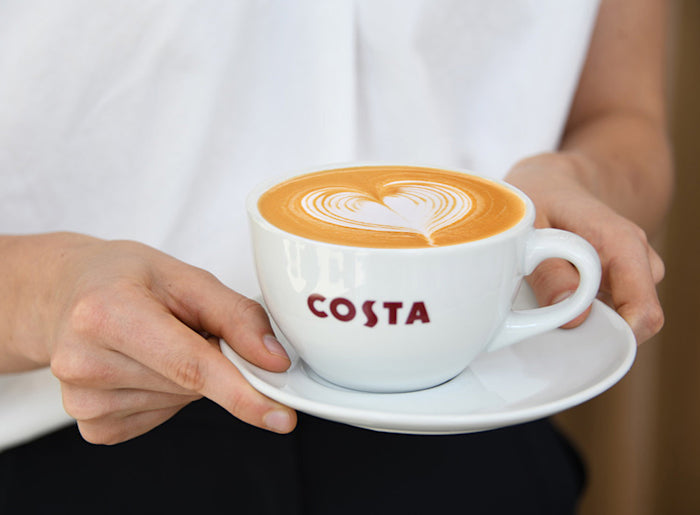Costa Coffee iced coffee cans, 12 pack, 11 fl. oz. each, displayed with vibrant branding and refreshing beverage appeal.
