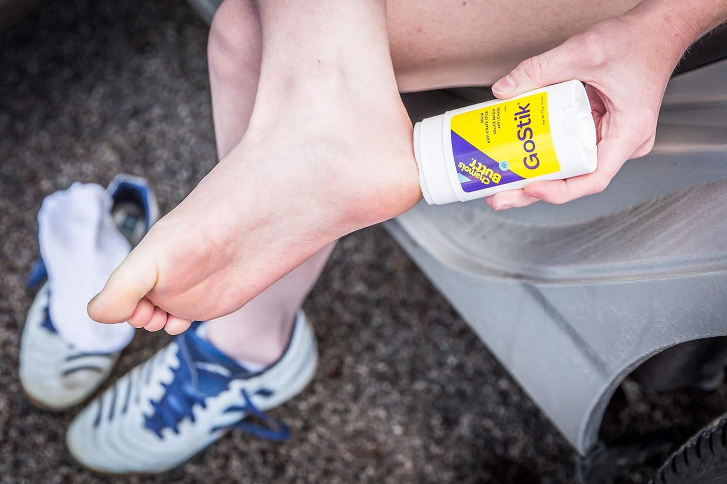 White PROLINE SPORTS NUTRITION Gostik Anti-Chafing Solid in 2.5-ounce container, smooth solid stick for skin protection.