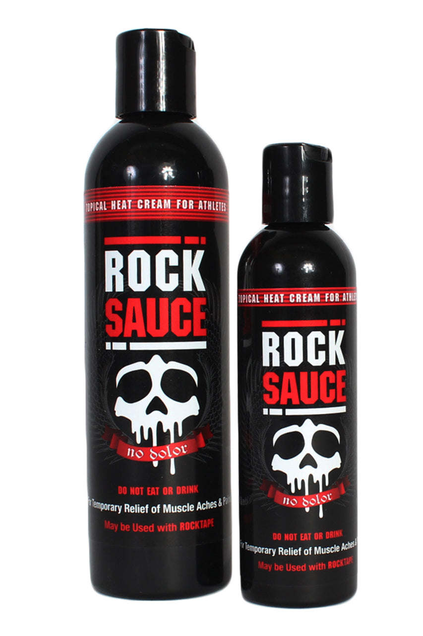 RockTape Rock Sauce 4 to 8-ounce bottle of muscle rub in a clear plastic container with a black cap.