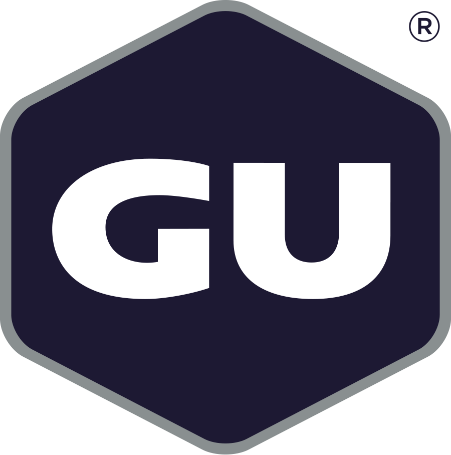 Assorted GU Energy Gel boxes with colorful packaging, featuring a variety of flavors for sustained energy during activities.