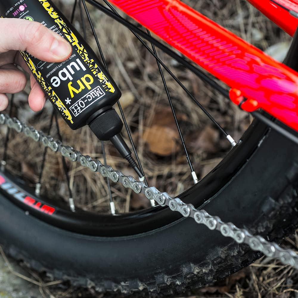 Muc-Off Dry Lube 120ml bottle for automotive parts, featuring a sleek design and easy-to-use applicator.