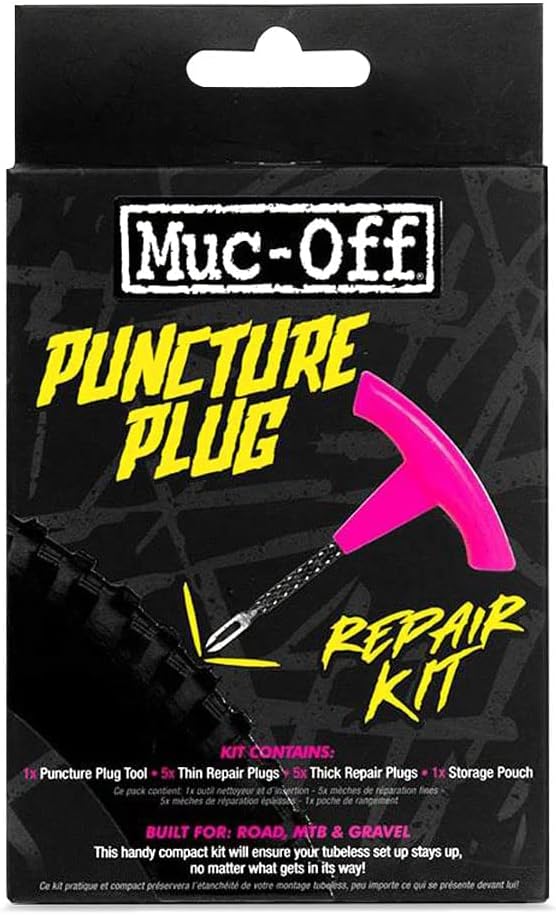Muc-Off puncture plug repair kit with tire plugger and plugs for tubeless MTB, road, and gravel bike tires in pink.