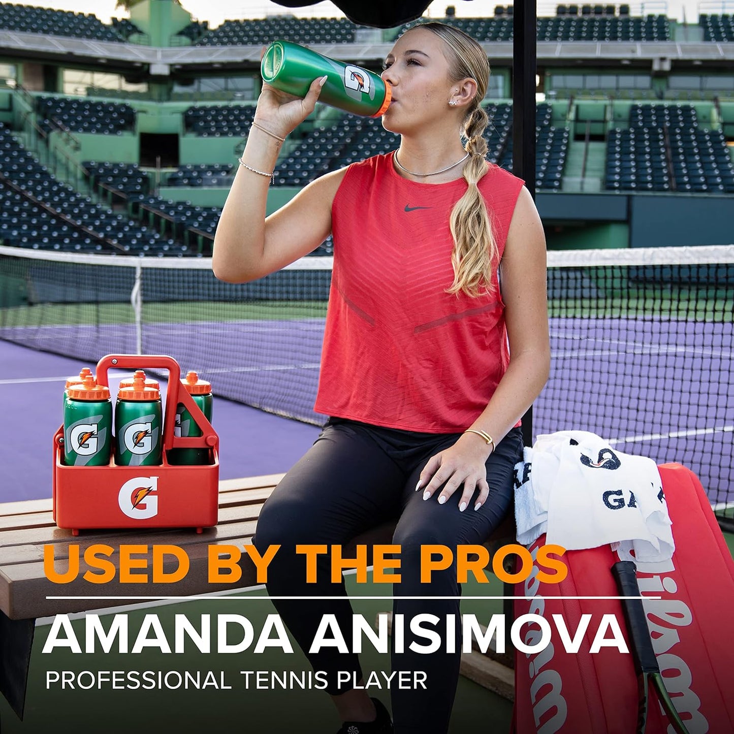 Gatorade water bottle carrier holding six 32oz bottles, featuring a sturdy design and comfortable handle for easy transport.