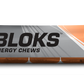 Clif Shot Bloks electrolyte chews in orange, 2.1oz pack of 6, displayed on a white background.