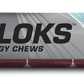 Six 2.1oz packs of Clif Shot Bloks electrolyte chews by Clif Bar, showing colorful fruit-flavored energy chews in resealable packs.