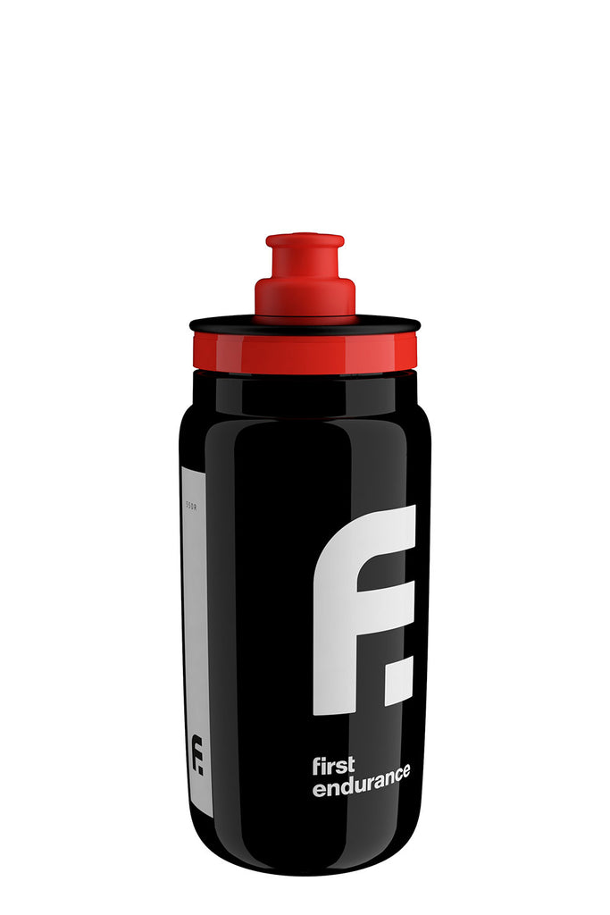 First Endurance Elite FLY water bottle with a black body and red cap, designed for athletes and active lifestyles.