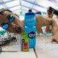 Eight GU Energy Labs Roctane Cherry Lime energy gels in 1.1oz packs, designed for athletic performance and endurance.