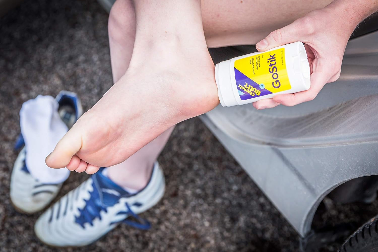 White PROLINE SPORTS NUTRITION Gostik Anti-Chafing Solid in 2.5-ounce container, smooth solid stick for skin protection.