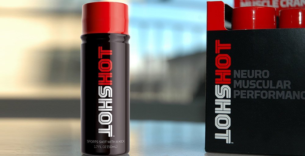 Proline Sports Nutrition HOTSHOT 12-pack bottles, 1.7oz each, for preventing and treating muscle cramps, with vibrant label design.