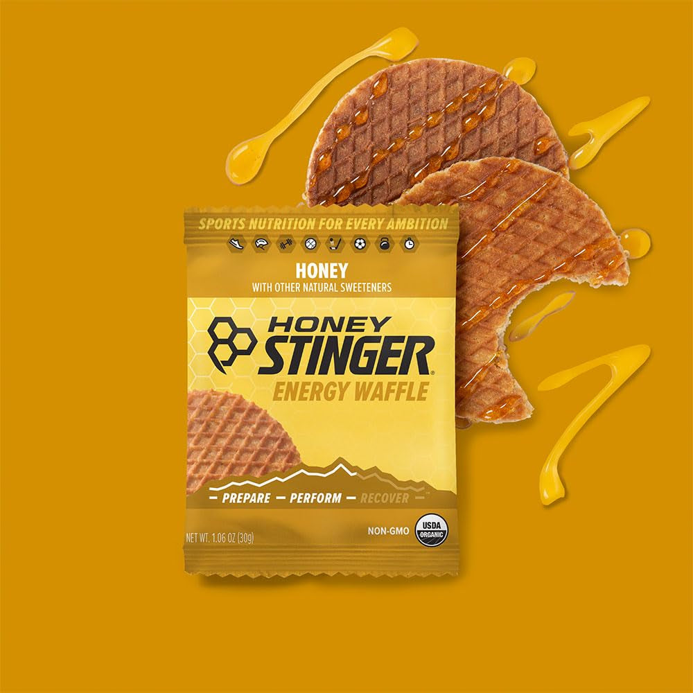 Organic Waffles Variety Pack by PROLINE SPORTS NUTRITION, 12-pack with honey, vanilla, and chocolate flavors, includes sticker.
