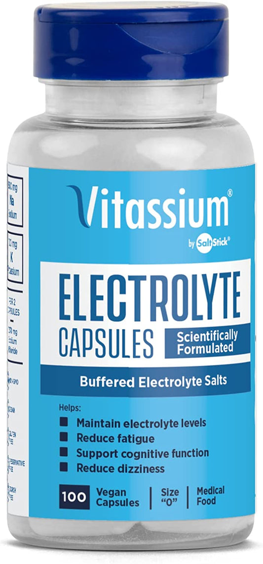 SaltStick Vitassium electrolyte replacement capsules in a 100-count bottle on a white background.