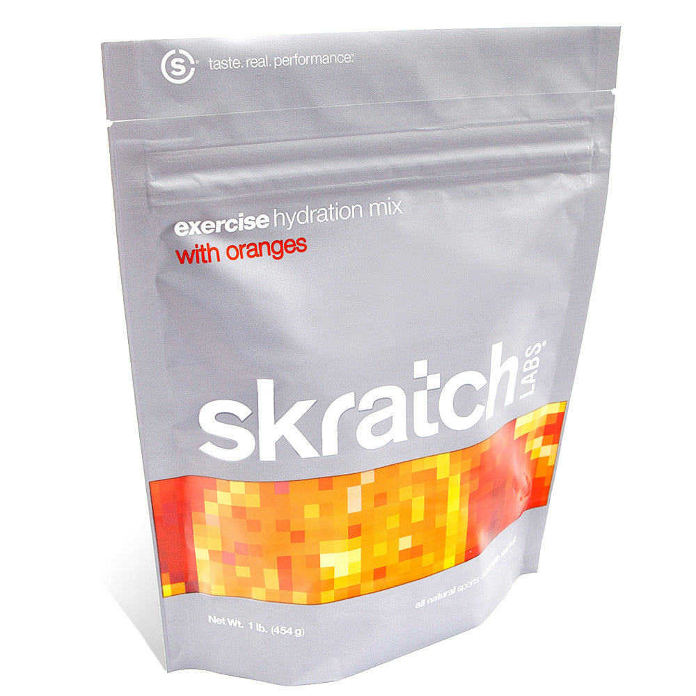 Skratch Labs Exercise Hydration Mix 1 lb. in a clear container, showing the secret drink mix powder for sports hydration.